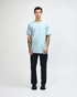 A light blue unisex short sleeve T-shirt with a crew neck and a simple design, featuring a logo.