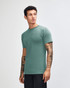 A unisex short sleeve T-shirt in teal, featuring a logo on the front, displayed from the side.