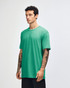 A unisex fine jersey short sleeve t-shirt in a vibrant turquoise colour, displayed from the side.