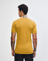 A unisex fine jersey short sleeve T-shirt in a mustard colour, view from the back, featuring a logo.