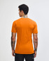 An orange unisex short sleeve t-shirt featuring a logo on the back.