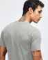 A grey fine jersey short sleeve t-shirt featured on a person from the back, showcasing the garment's fit and style.