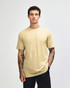 A unisex short sleeve t-shirt in a pale yellow colour, displayed on a model against a plain background.