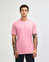 A unisex short sleeve T-shirt in pink, featuring a crew neck and a plain design, with a logo present.