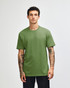 A unisex short sleeve T-shirt in a vibrant green colour, displayed on a model standing against a plain background.