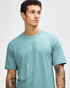 A unisex short sleeve t-shirt in a soft turquoise colour, featuring a logo on one side.