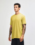 A unisex short sleeve t-shirt in a vibrant yellow colour with a casual fit, displayed on a model.