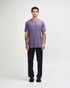 A unisex short sleeve T-shirt in purple, paired with black cargo pants. It features a logo on the shirt.