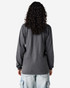 A long-sleeve grey T-shirt made from fine jersey material, featuring a simple design and a logo on the back.