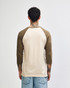 A unisex raglan T-shirt featuring a beige body and brown sleeves, with a plain design and no visible logo.