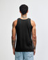 A black unisex fine jersey tank top is worn by a model, featuring a simple design and a logo.