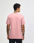 A unisex V-neck T-shirt in soft pink, featuring a plain back and comfortable fit. Includes a logo on the label.