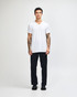 A white unisex V-neck T-shirt displayed on a model, featuring short sleeves and a logo.
