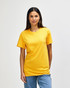 A model wearing a bright yellow Gildan Heavy Cotton adult T-shirt, standing against a plain white background.
