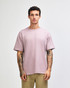 A model wearing a purple American Apparel Super Heavyweight T-Shirt, paired with olive green shorts.