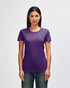 A purple Gildan Heavy Cotton Ladies' T-Shirt is displayed on a model, featuring short sleeves and a round neckline.