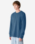 A long sleeve t-shirt in a blue colour, featuring a logo, worn by a model standing sideways.