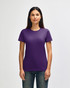 A purple ladies' t-shirt is displayed on a model. The shirt features a logo on the front.