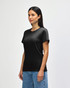 A black midweight t-shirt for ladies, featuring a classic fit and short sleeves. The model is wearing it with jeans.