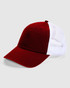 A red and white American Apparel washed trucker cap with a mesh back and curved brim.