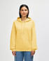 A yellow Gildan Softstyle adult hooded sweatshirt displayed on a model, featuring a front pocket and a logo.