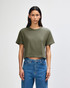 A women's boxy T-shirt in olive green, featuring short sleeves and a relaxed fit, with a branding logo.