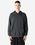 A unisex hoodie in dark grey featuring a front pocket and a drawstring hood. It has a brand logo.