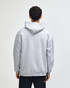 A unisex hooded sweatshirt in grey, featuring a hood and a relaxed fit with a branding logo.