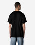 A black Gildan Light Cotton T-shirt displayed on a model from the back, paired with denim jeans.