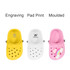 Three pairs of pet clog slides in yellow, white, and pink, featuring various designs and a logo on the white pair.