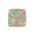 A square acetate vanity mirror in pastel colours of pink, green, and yellow with a small hole in one corner.