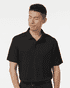 A black men's polo shirt features a collar, short sleeves, and a logo on the chest. 
