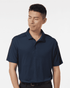 A navy blue men's polo shirt with a collar and short sleeves, featuring a logo on the chest area.