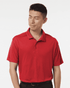 A red men's polo shirt with a collar and button placket, featuring a logo on the chest.