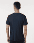 A navy blue men's polo shirt, featuring a logo on the back, displayed on a model from the rear.