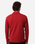 A red long-sleeve polo shirt with a collar, featuring a logo on the back.