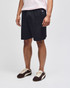 A pair of black cotton gym shorts with an elastic waistband and logo branding.