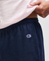Navy gym shorts featuring an elastic waistband and a logo on the side. Ideal for athletic wear.