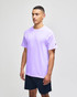 A lavender short sleeve t-shirt with a logo on the sleeve, paired with navy shorts.