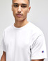 A white short sleeve t-shirt for adults featuring a logo on the sleeve.