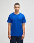 A blue short sleeve t-shirt featuring a logo on the sleeve.