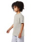 A light grey short sleeve youth t-shirt with a logo on the sleeve, displayed on a model.