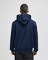 A navy blue pullover hooded sweatshirt with a logo on the back, featuring a relaxed fitting design.