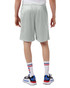 A person wearing light grey athletic shorts, paired with colourful socks and sneakers, viewed from the back.