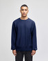 A navy blue adult crew sweatshirt featuring a logo, with long sleeves and a relaxed fit.