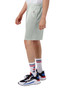 A pair of light grey athletic shorts with an elastic waistband, worn with colourful socks and sneakers featuring a logo.