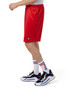 Red mesh sports shorts with pockets, featuring a logo, worn with white and red striped socks and athletic shoes.