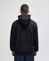 A black pullover hooded sweatshirt featuring a logo, viewed from the back.