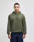 A green pullover hooded sweatshirt with a front pocket, worn by a model against a light background.
