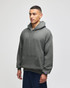 A grey pullover hooded sweatshirt with a front pocket and a small logo on the sleeve.